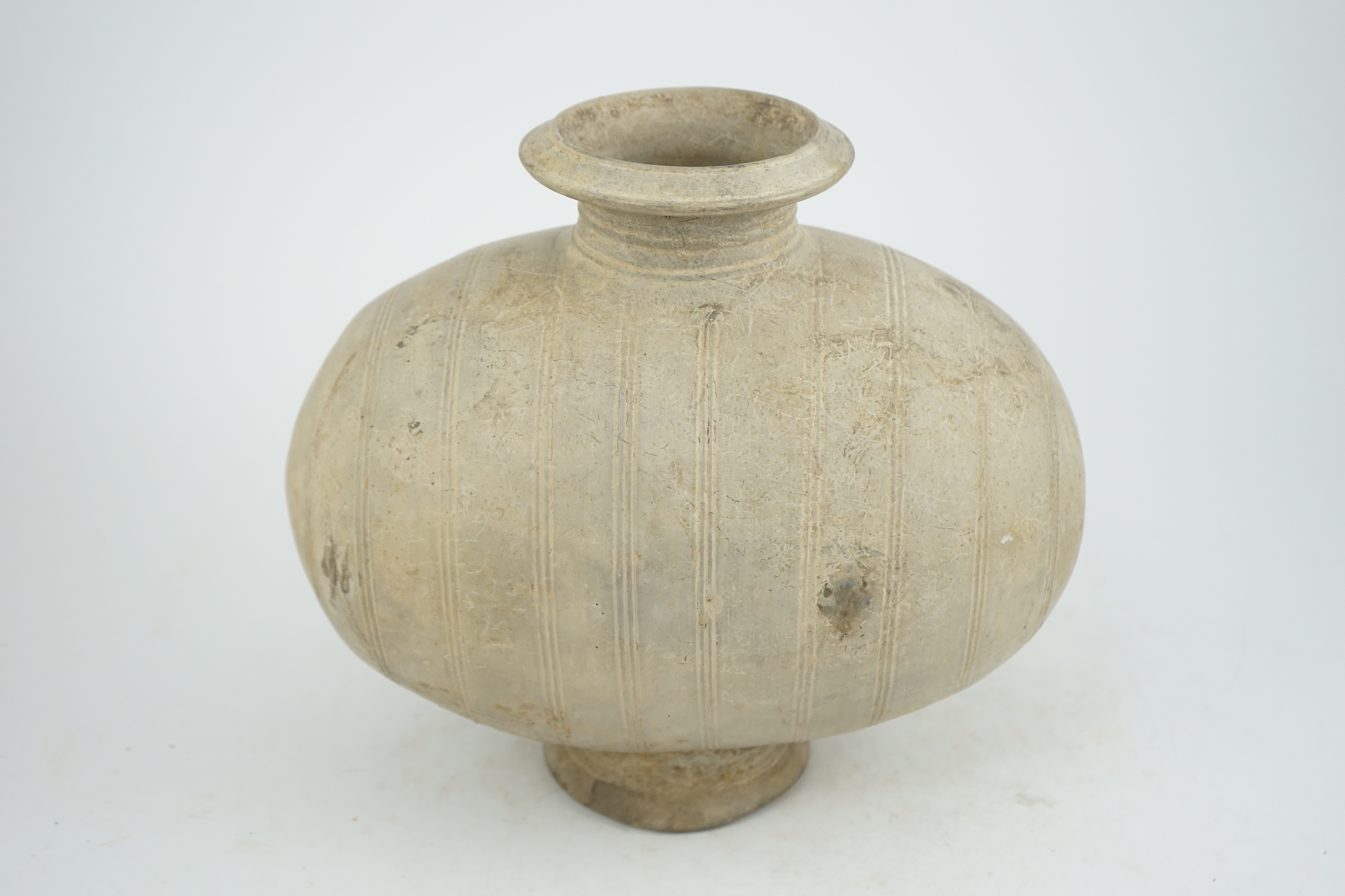 A fine large Chinese burnished pottery cocoon jar, Western Han Dynasty (206 BC-AD 8) or possibly as early as the Qin Dynasty (221-206 BC)